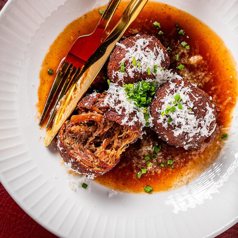 Oxtail meatballs with brown stew reduction at Fraiche DC